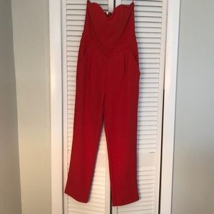 Red sleeveless express jumpsuit